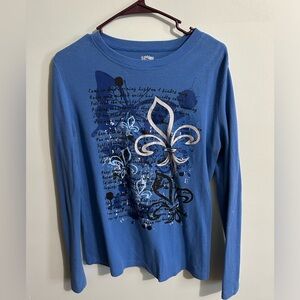 Blue long sleeved top with design